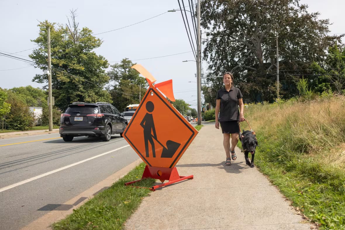 Concerns regarding construction accessibility are raised after a blind woman almost gets struck at an intersection