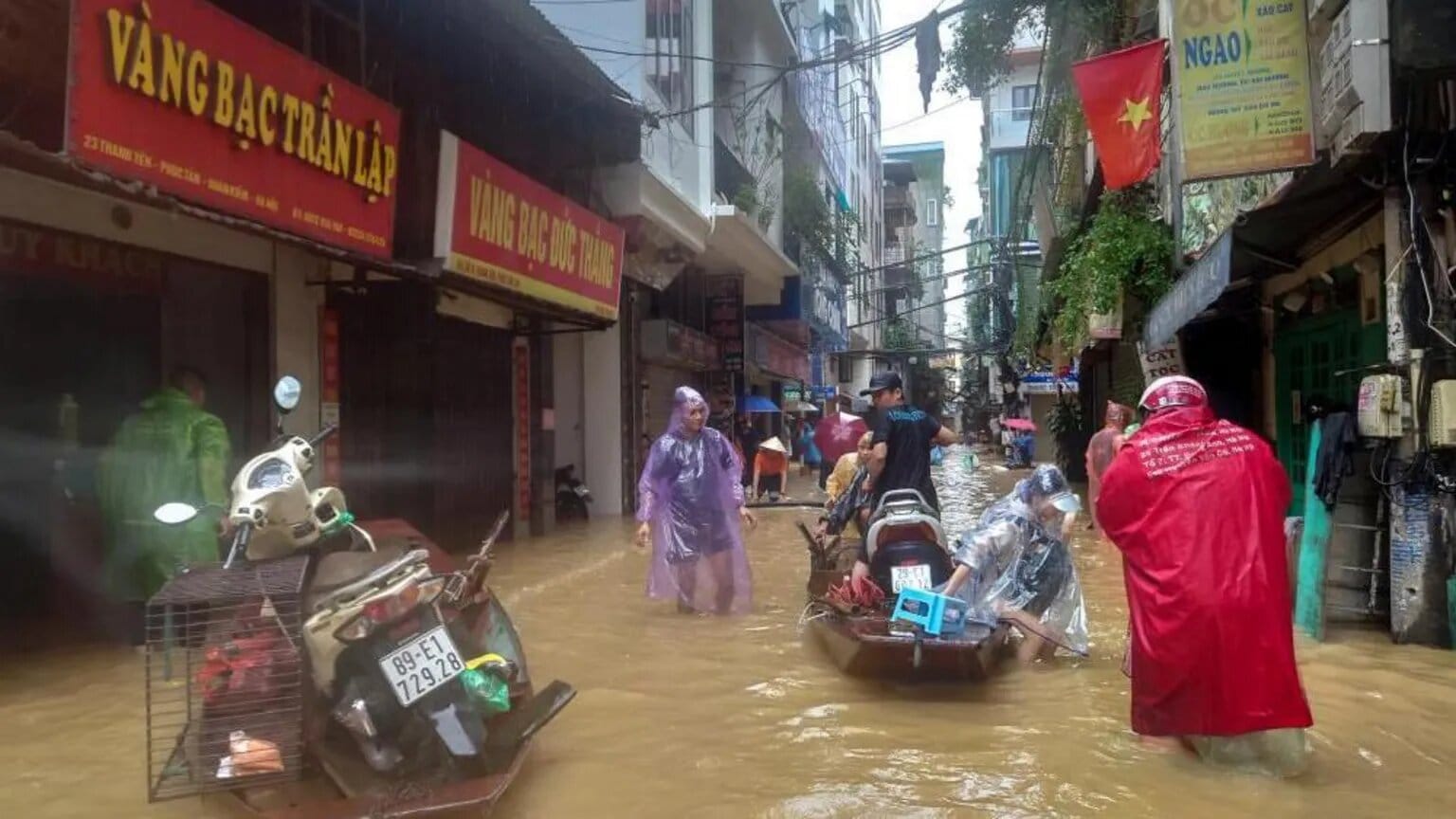 Floods in Vietnam force many to escape after typhoon