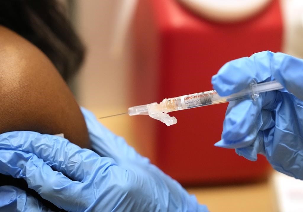 Albertans may start scheduling COVID and flu shots