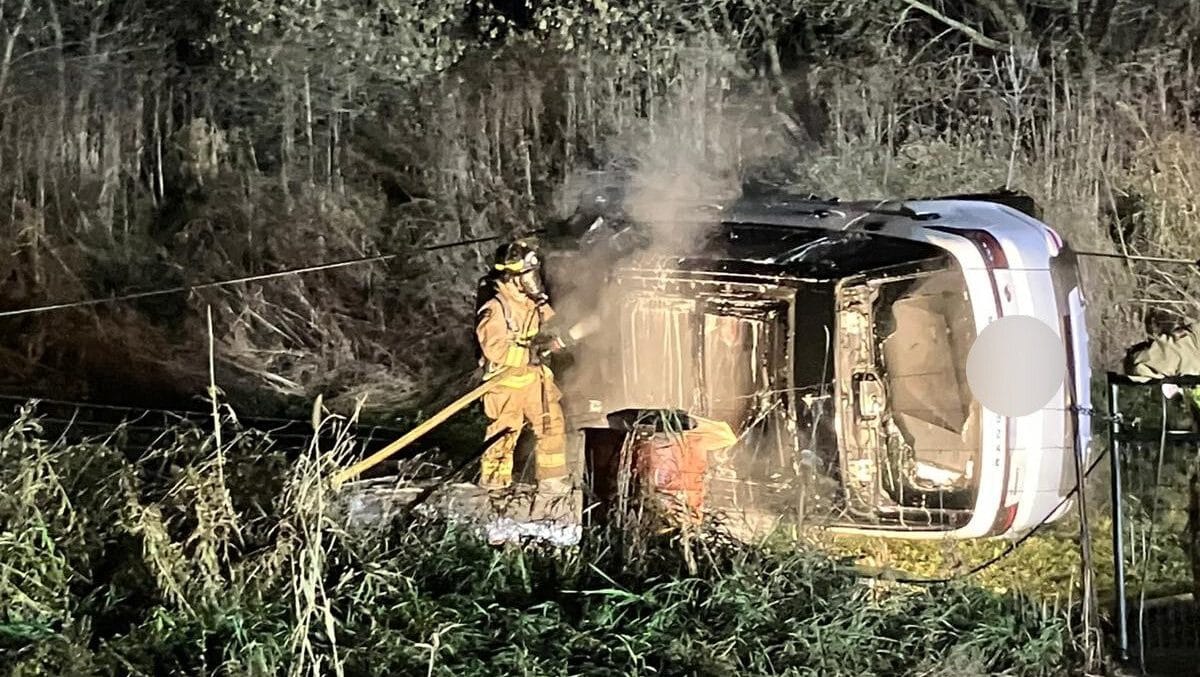 Single-vehicle rollover crash leads to downed wires, fire in Navan