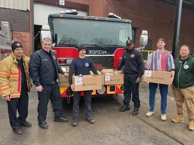 Montreal firefighters make thousands of children happy and 1,300 families grateful with the 37th major Christmas basket distribution