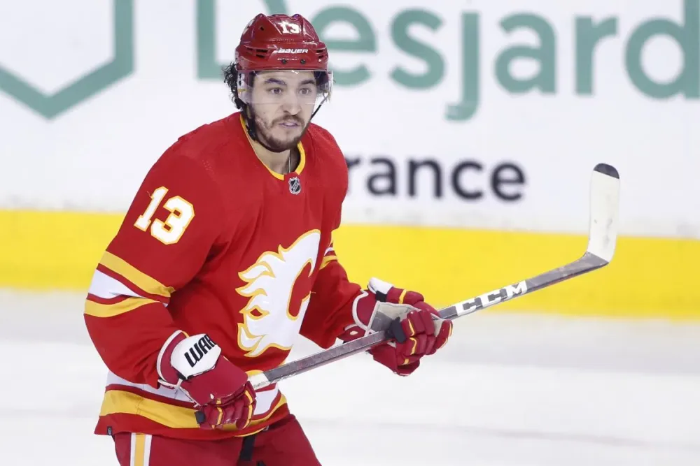 Makeshift memorial for Johnny Gaudreau continues to grow, attract visitors in Calgary post image