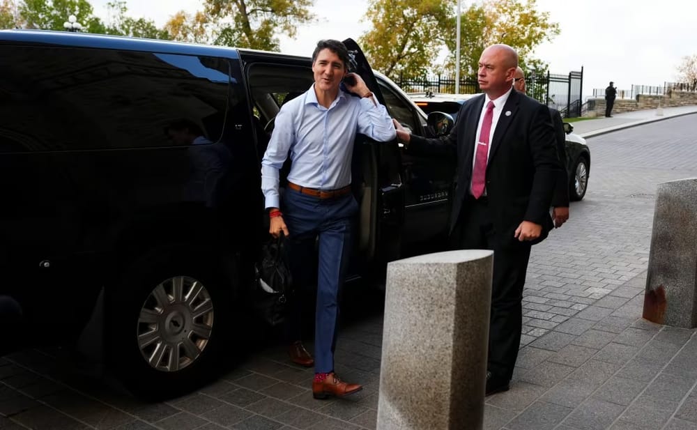 Minister says he doesn't 'expect' Trudeau to step down as MPs confront PM at caucus meeting post image