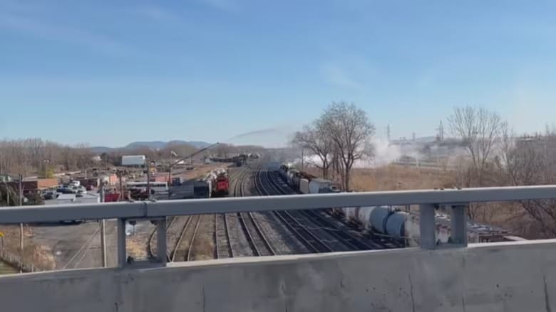 Train derails in Longueuil, Que., raising concerns about possible chemical spill post image